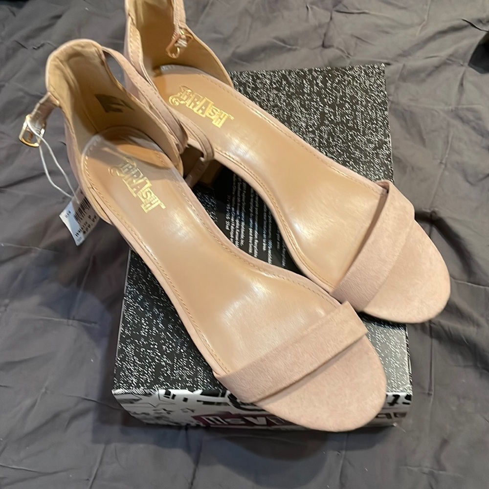 Cream color size 9 low heels.